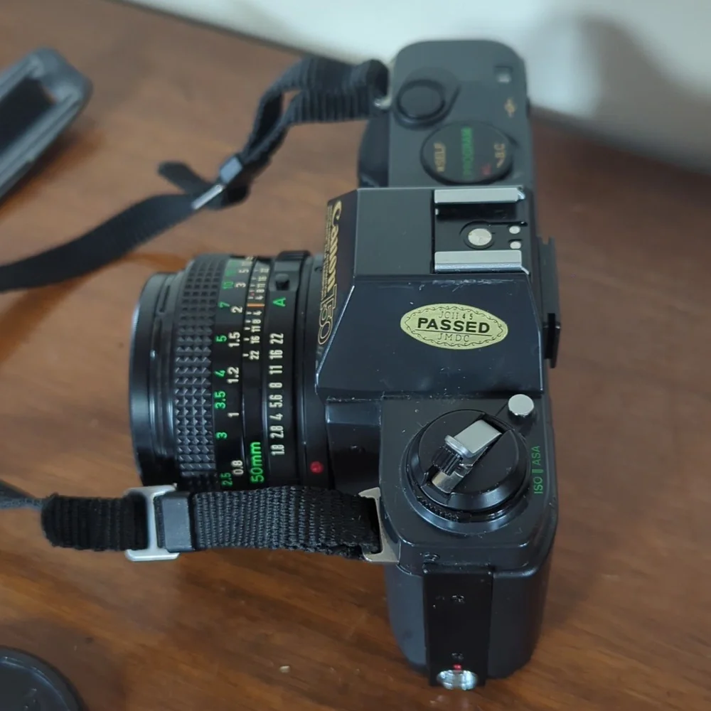 Vintage Canon T50 35mm SLR with Flash and Carrying Case